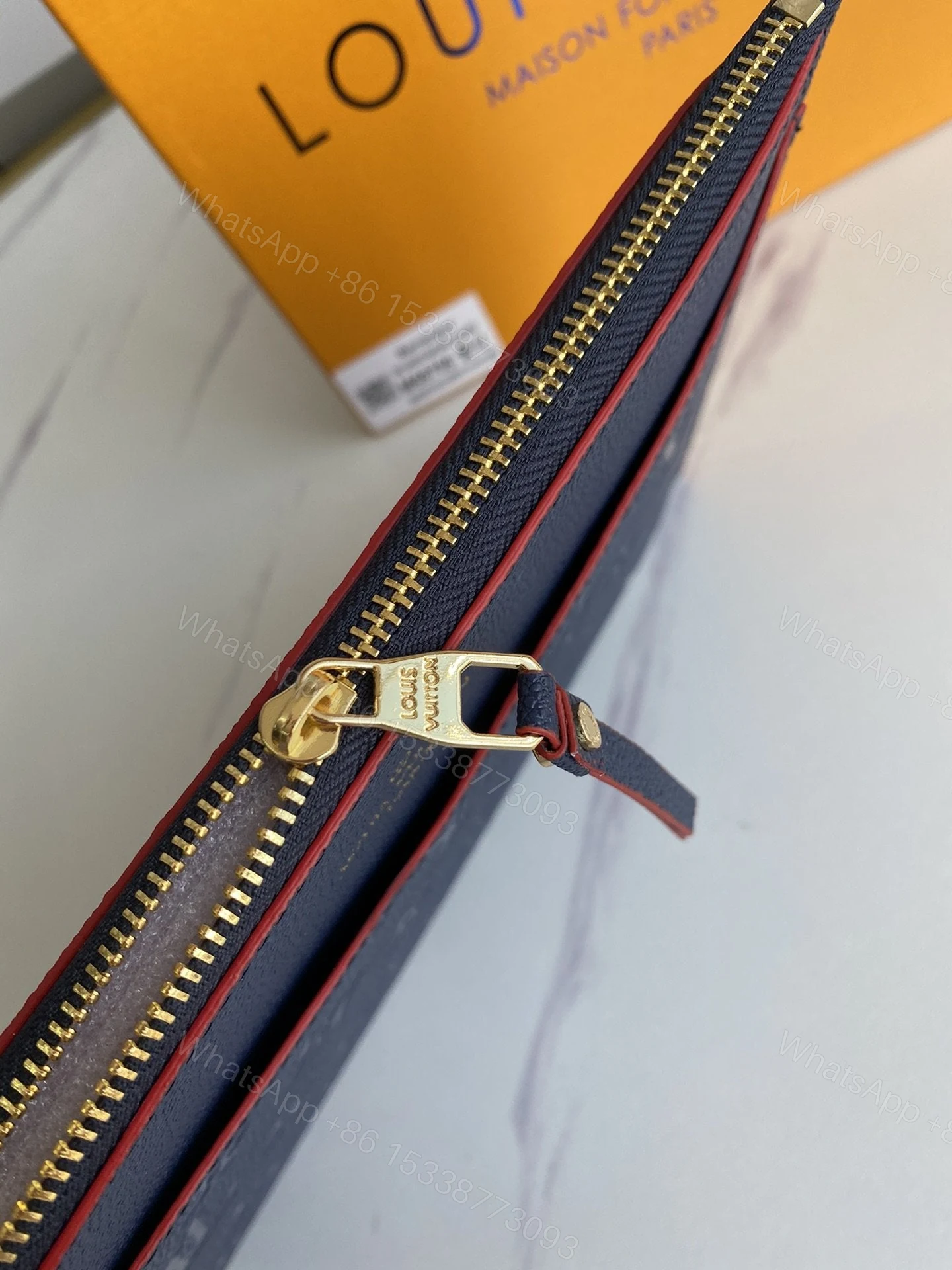 View 5 of Louis Vuitton Marine Rogue Monogram Empreinte Daily Pouch
