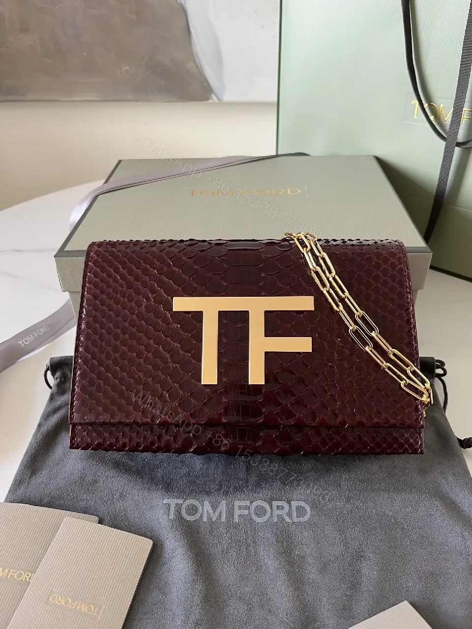 Burgundy Python Textured Clutch with TF Gold Hardware — view 1