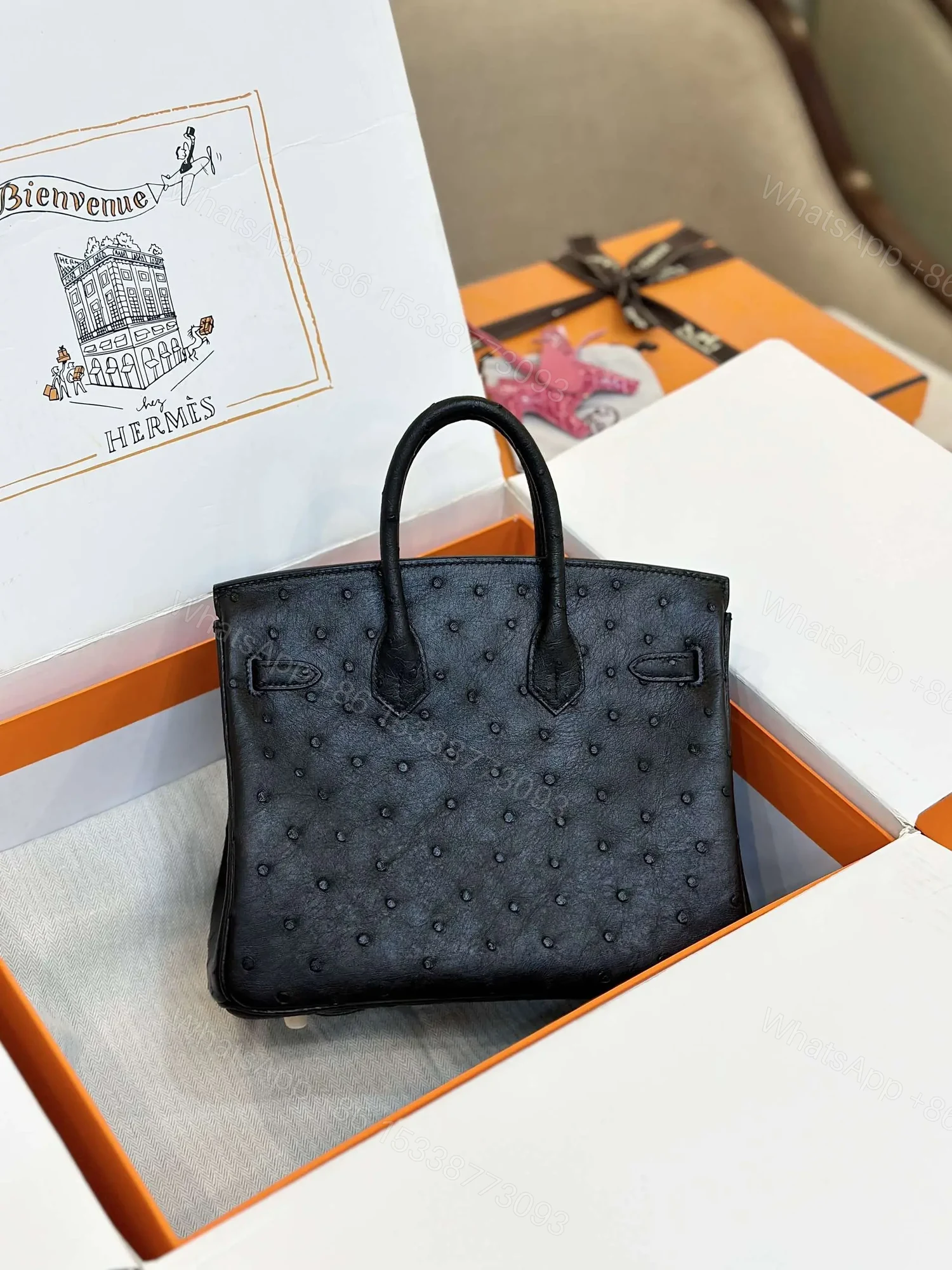 View 7 of HN 25 Black Ostrich Leather Gold Hardware