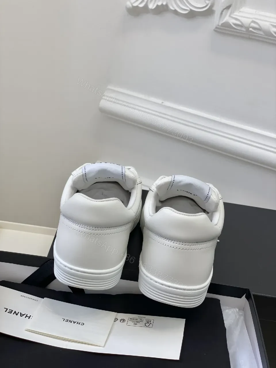 View 7 of White Leather Sneakers: Minimalist High-Tops with Gold Logo