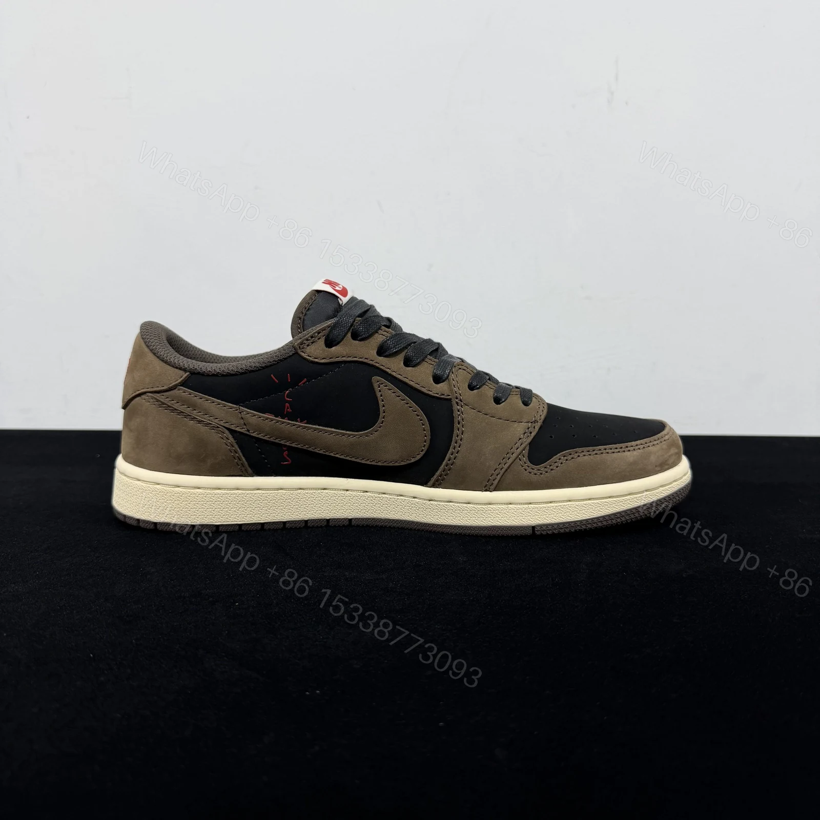 View 2 of Travis Scott x Air Jordan 1 Low Mocha Reps