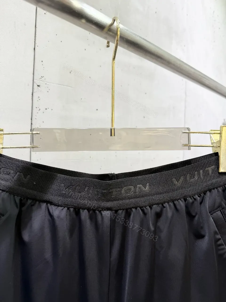 View 8 of Matte Black Quick-Dry Shorts with Subtle LV Detailing