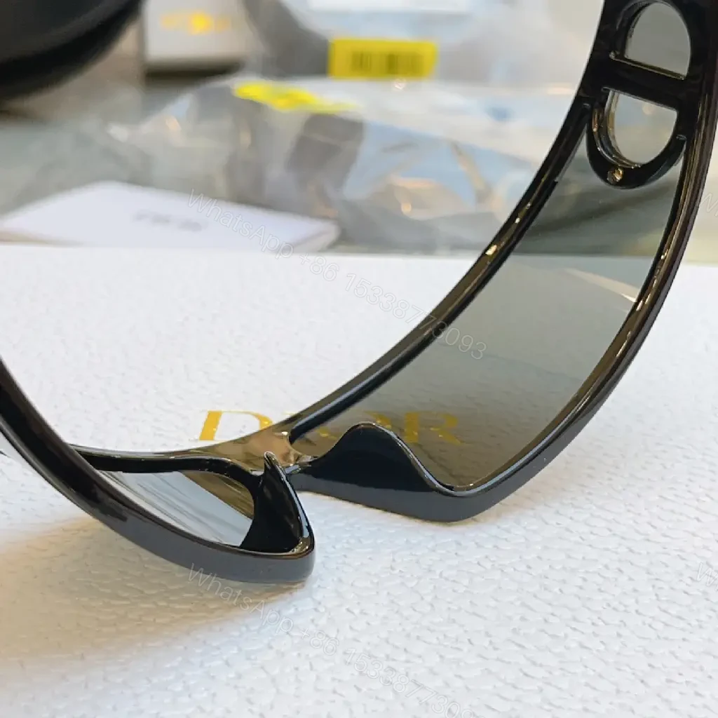 View 2 of Black Frame Sunglasses: Futuristic Wraparound, Dior Gold Logo Lenses