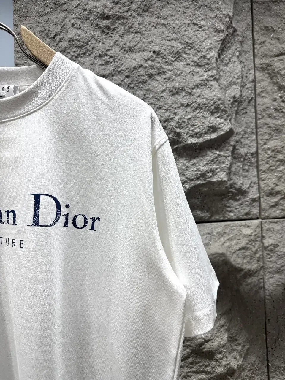View 2 of White Cotton Crewneck Tee - Subtle Designer Crest, Everyday Luxury