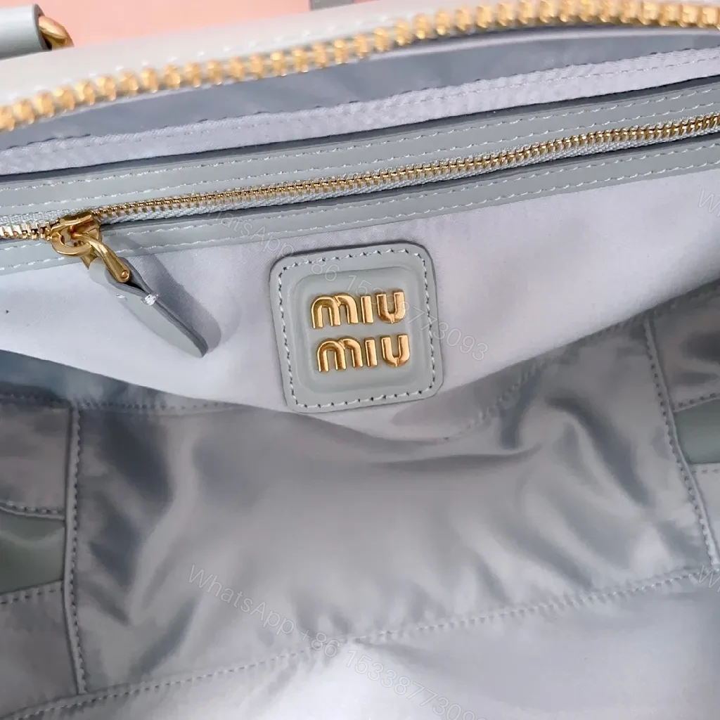 View 2 of Structured Dome Bag: Compact Luxury, Gold Accents, Versatile Style