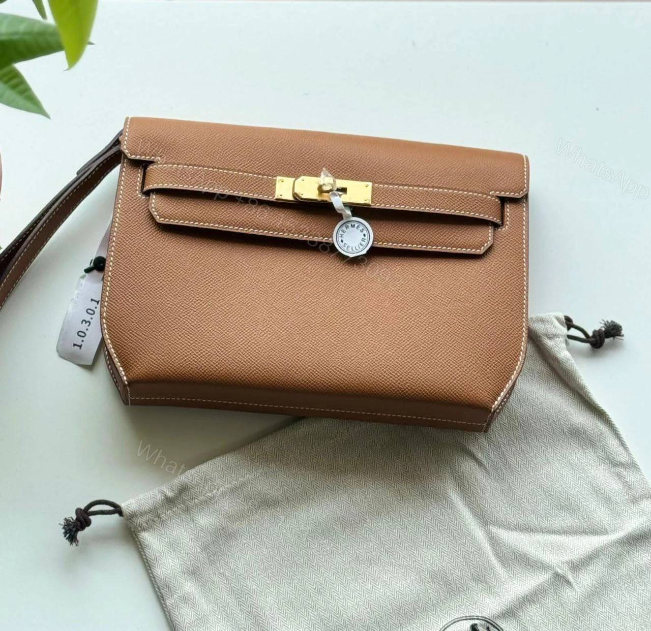View 3 of Hermes Kelly Depeches 25 Pouch in Bordeaux Epsom Calfskin