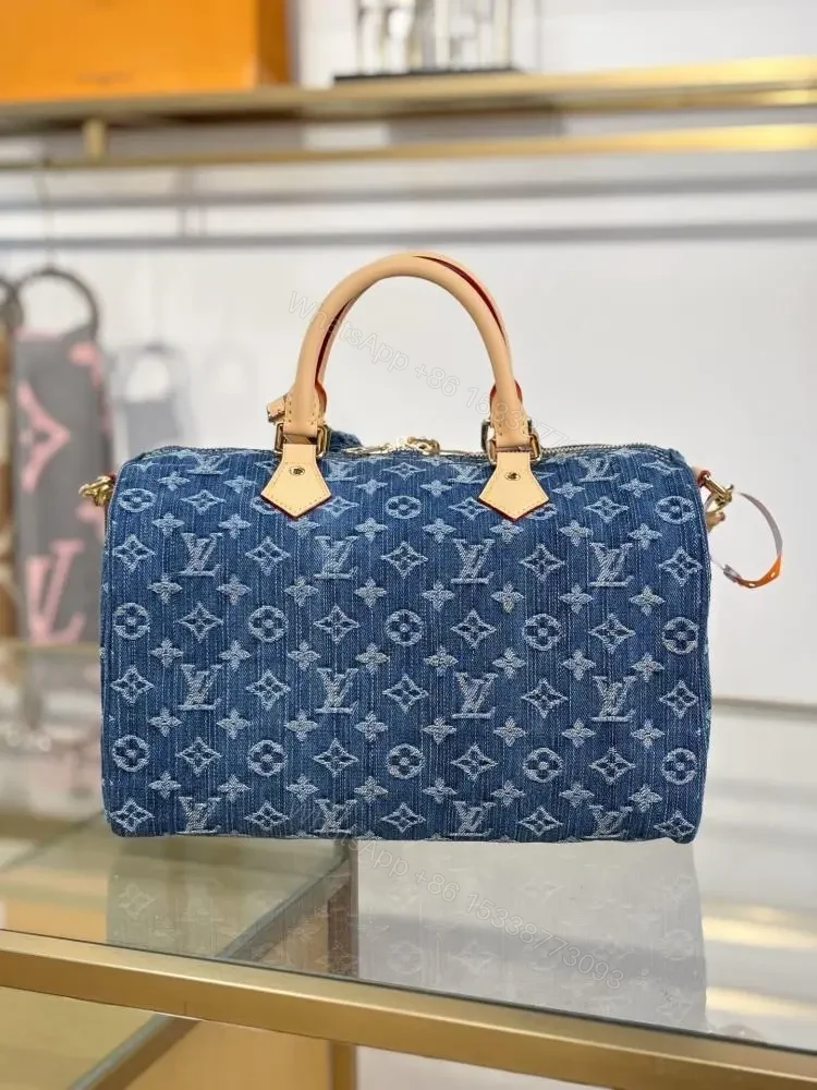 View 7 of Louis Vuitton Monogram Denim Speedy Soft 30 bag