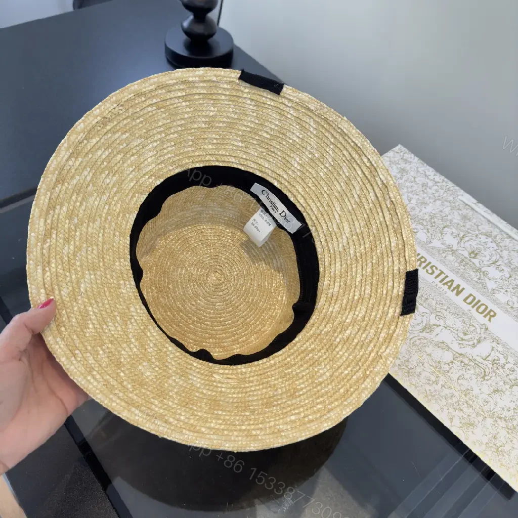 View 10 of Natural Straw Wide-Brim Hat with Black Ribbon Accent