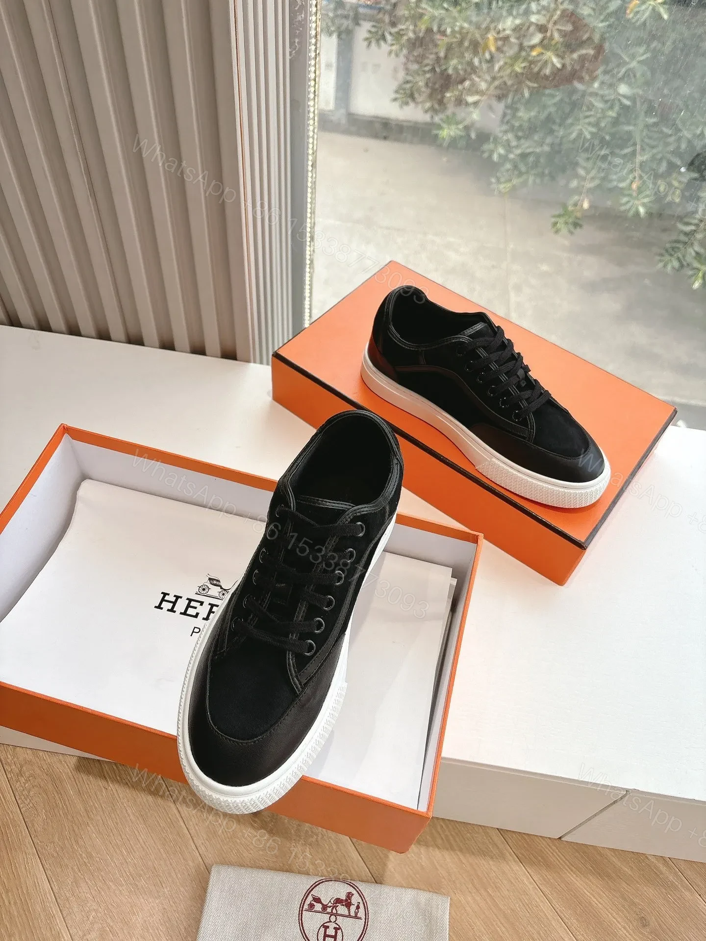 View 2 of Hermes Women Black Suede Leather Sneakers
