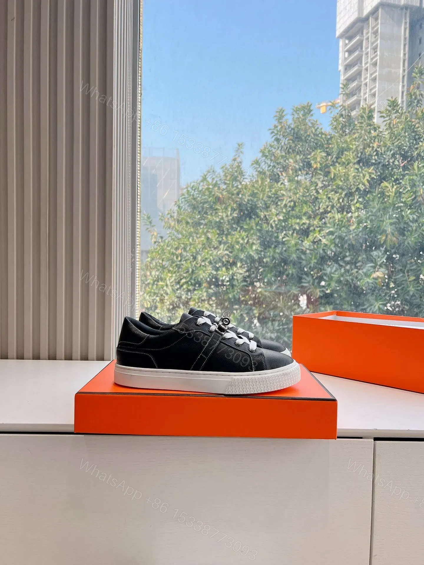 View 2 of Hermes Women Black Leather Sneakers With Buckle Strap