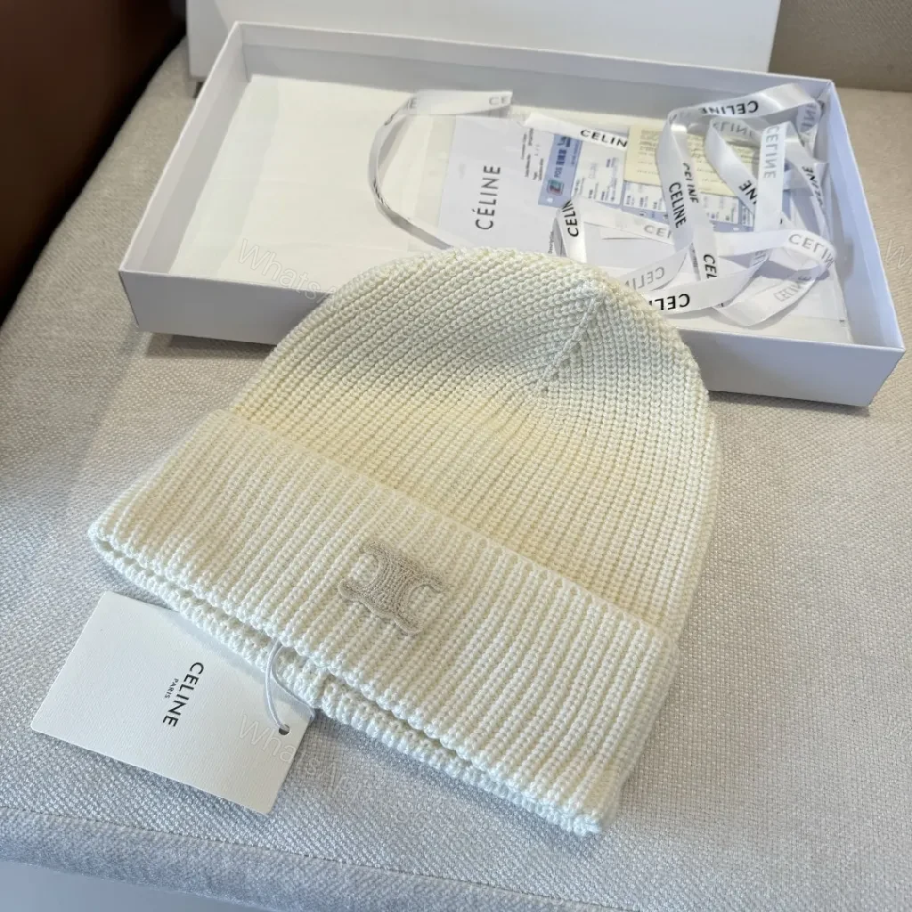 View 7 of Cream Knit Beanie + Ribbed Material + Minimalist Style + Subtle Monogram + Beanie