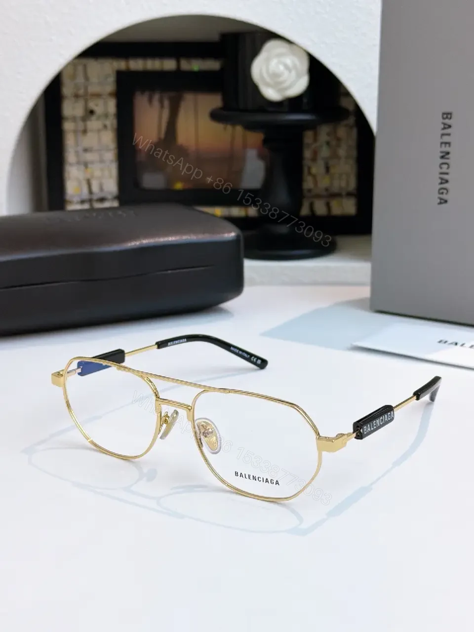 View 2 of Silver Metal Aviator Sunglasses: Luxe Slim Frames with Logo Detailing