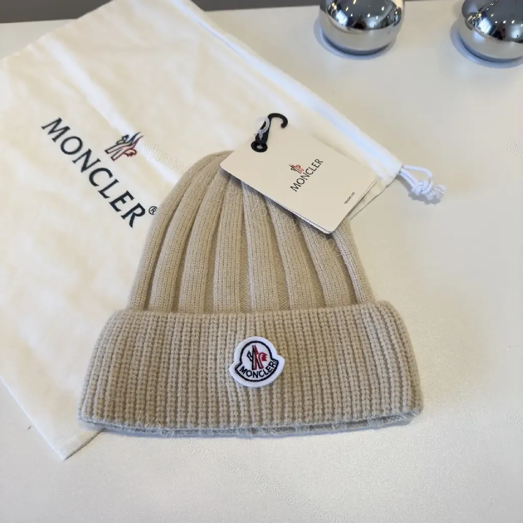 View 5 of Beige Ribbed Knit Beanie – Luxury, Signature Patch, Everyday Style