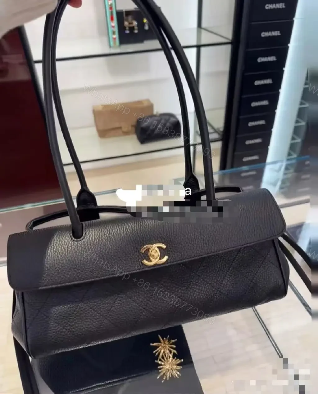 View 8 of Quilted Black Leather Handbag with Gold Hardware Luxury