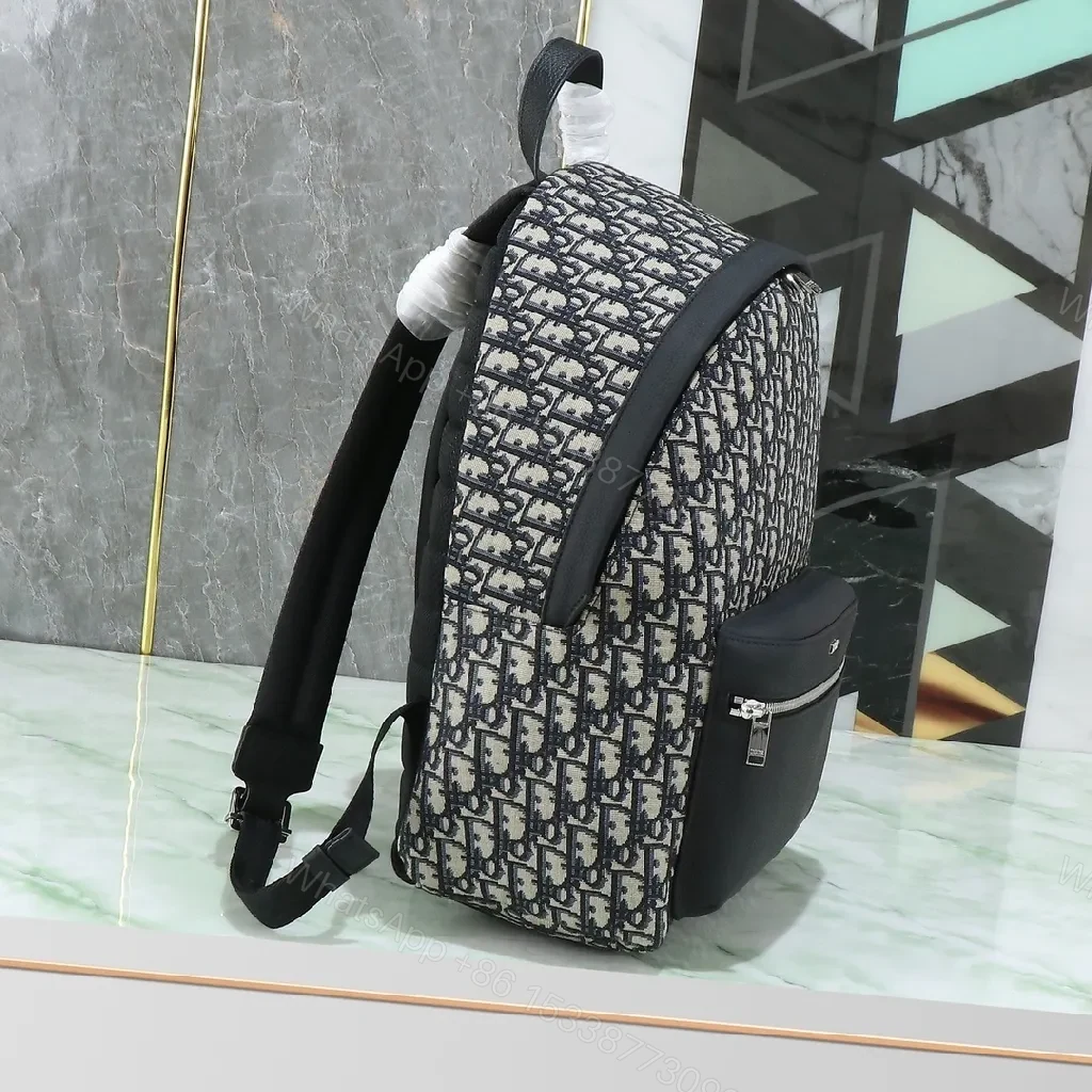 View 2 of Compact Monogram Backpack: Luxe, Modern, Functional Carry