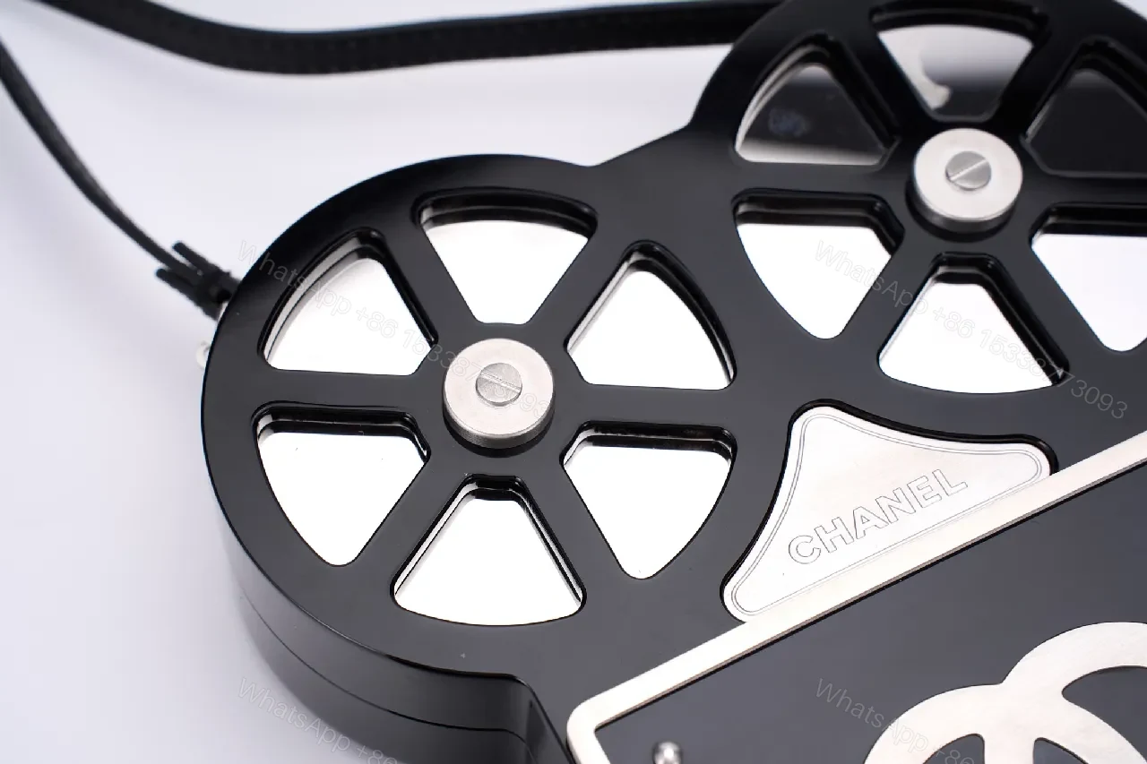 View 5 of Compact Reel-Clutch: Lux Gloss Hardware with Architectural Silhouette