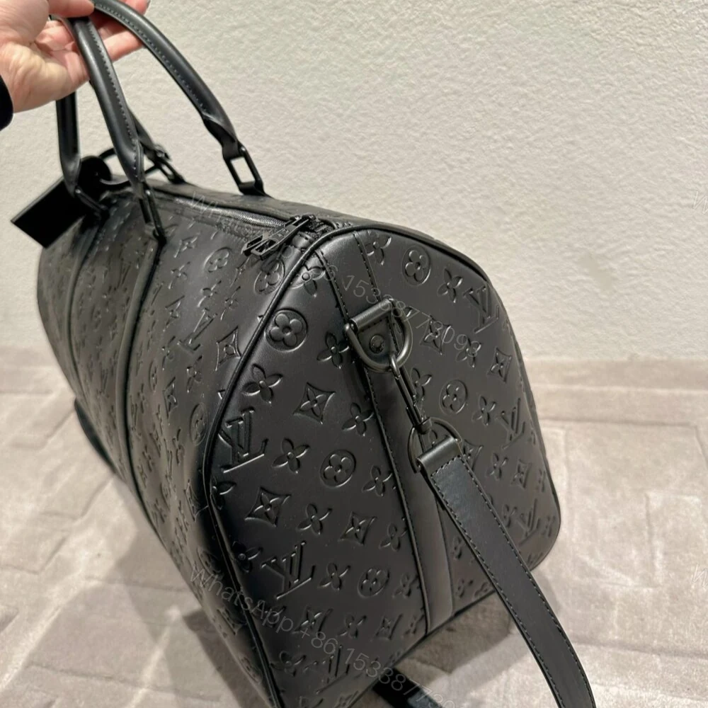 View 5 of Louis Vuitton Keepall Bandoulière 50 Black 50Cm M44810