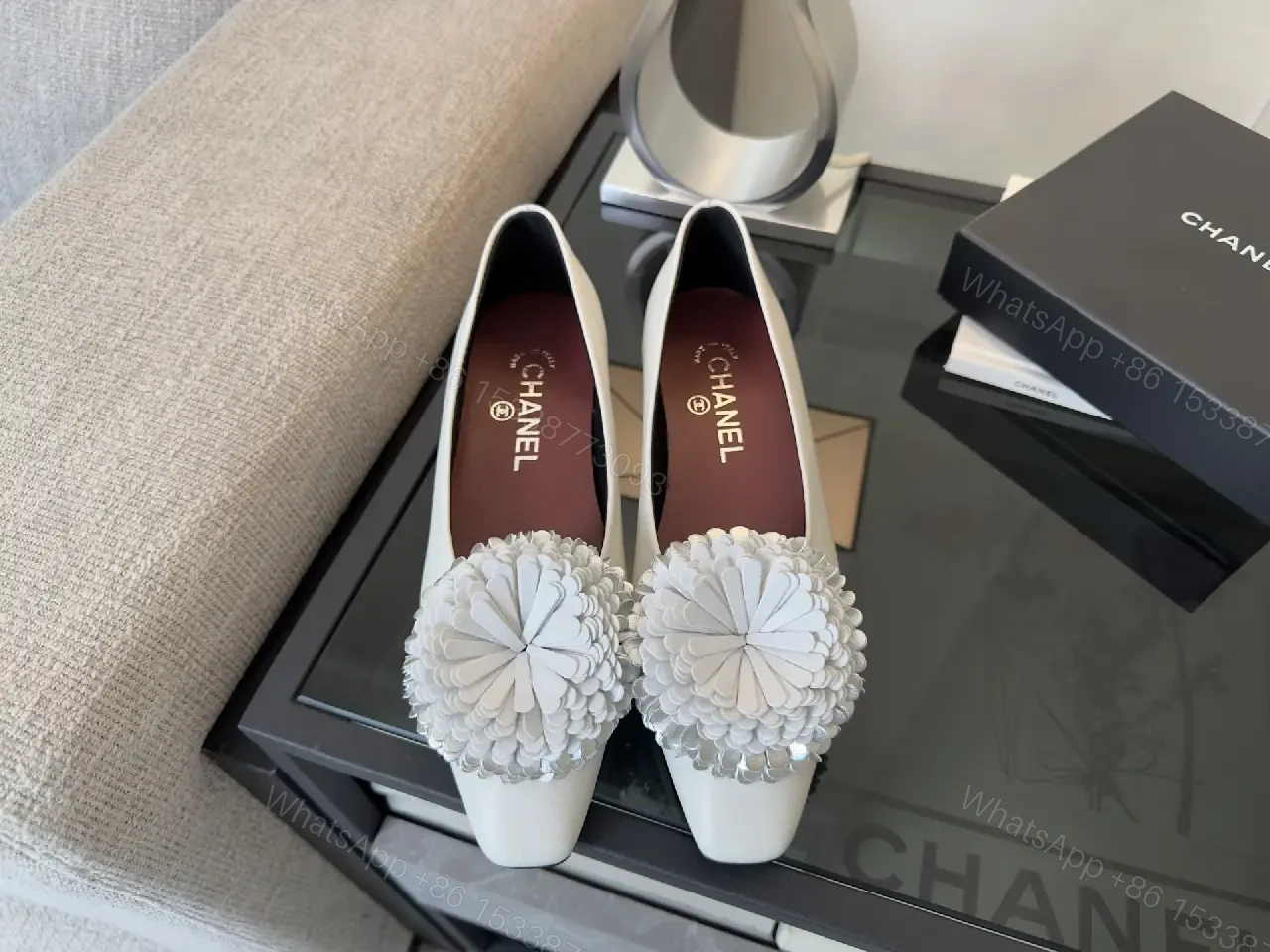 View 4 of White Leather Flats with Crochet Pom Floral—Chic Pointed-Toe Pumps