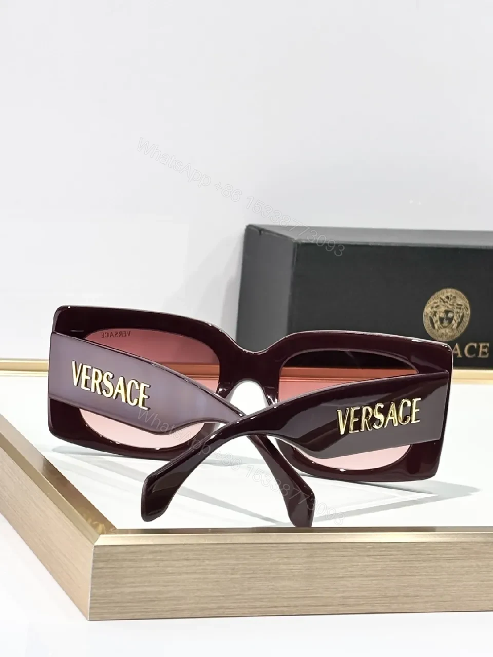 View 3 of Bold Black Statement Sunglasses with Logo-Injected Glamour
