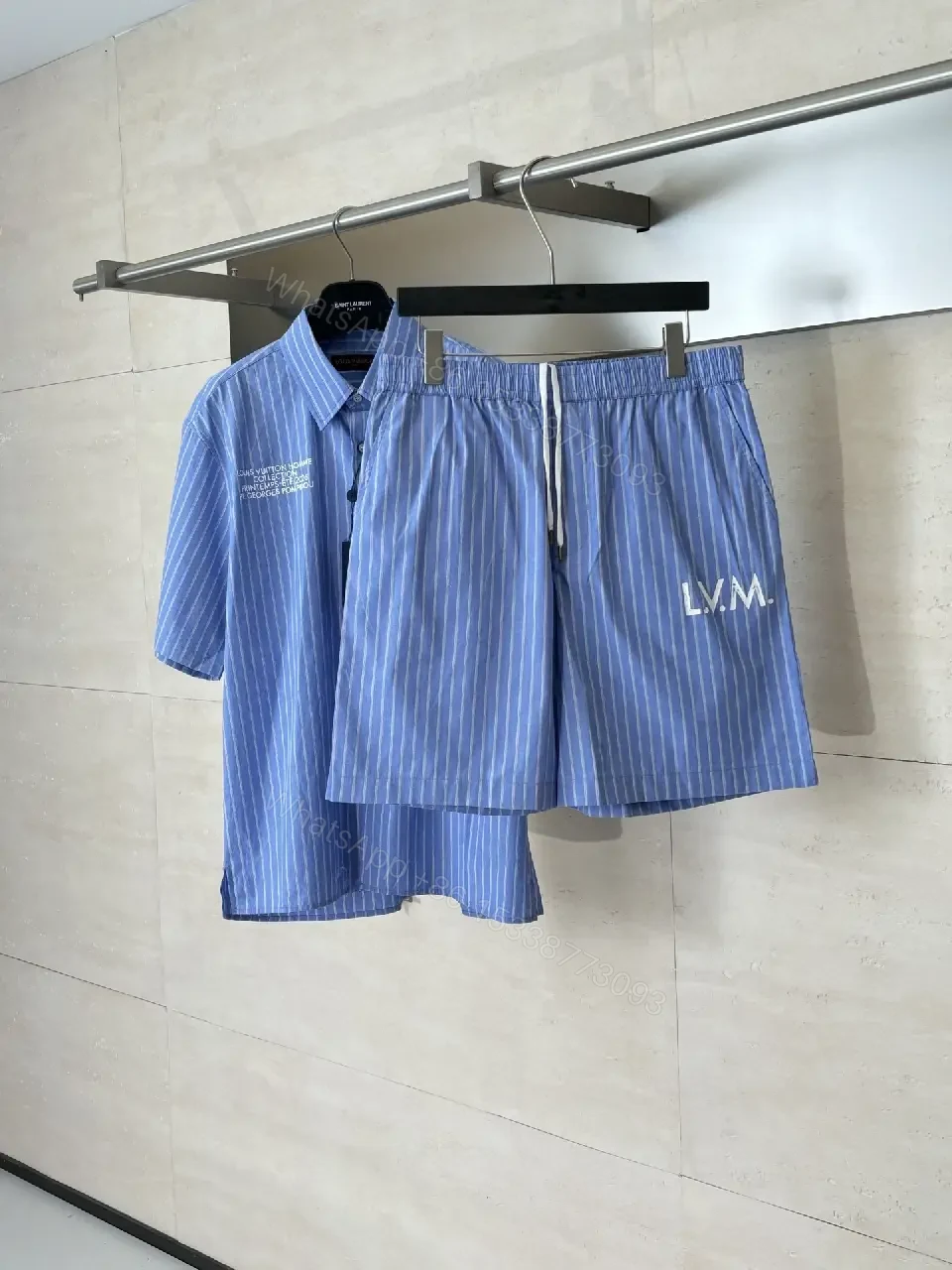 View 5 of Blue Striped Lightweight Drawstring Shorts - Subtle Embossed Logo Luxury