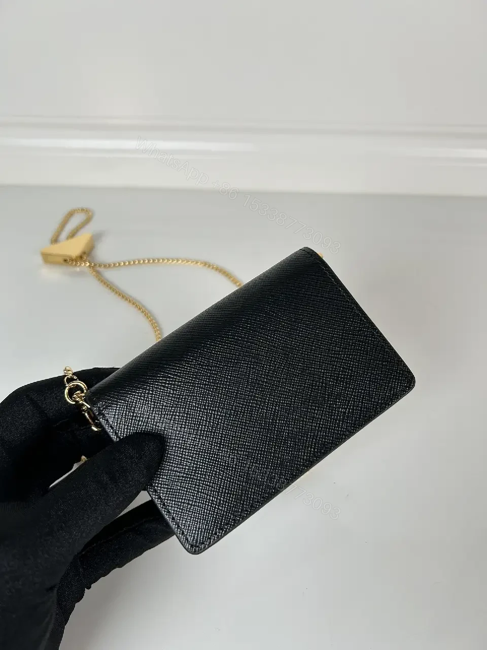 View 2 of Compact Crossbody Bag: Black Leather, Gold Chain, Minimalist Luxe