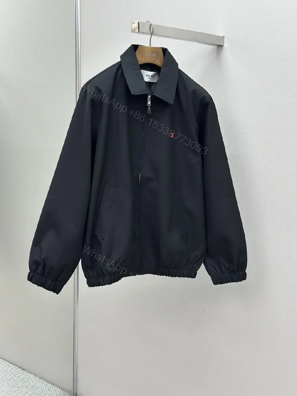 View 3 of Minimalist Black Coach Jacket: Premium, Wind-Resistant Utility Jacket