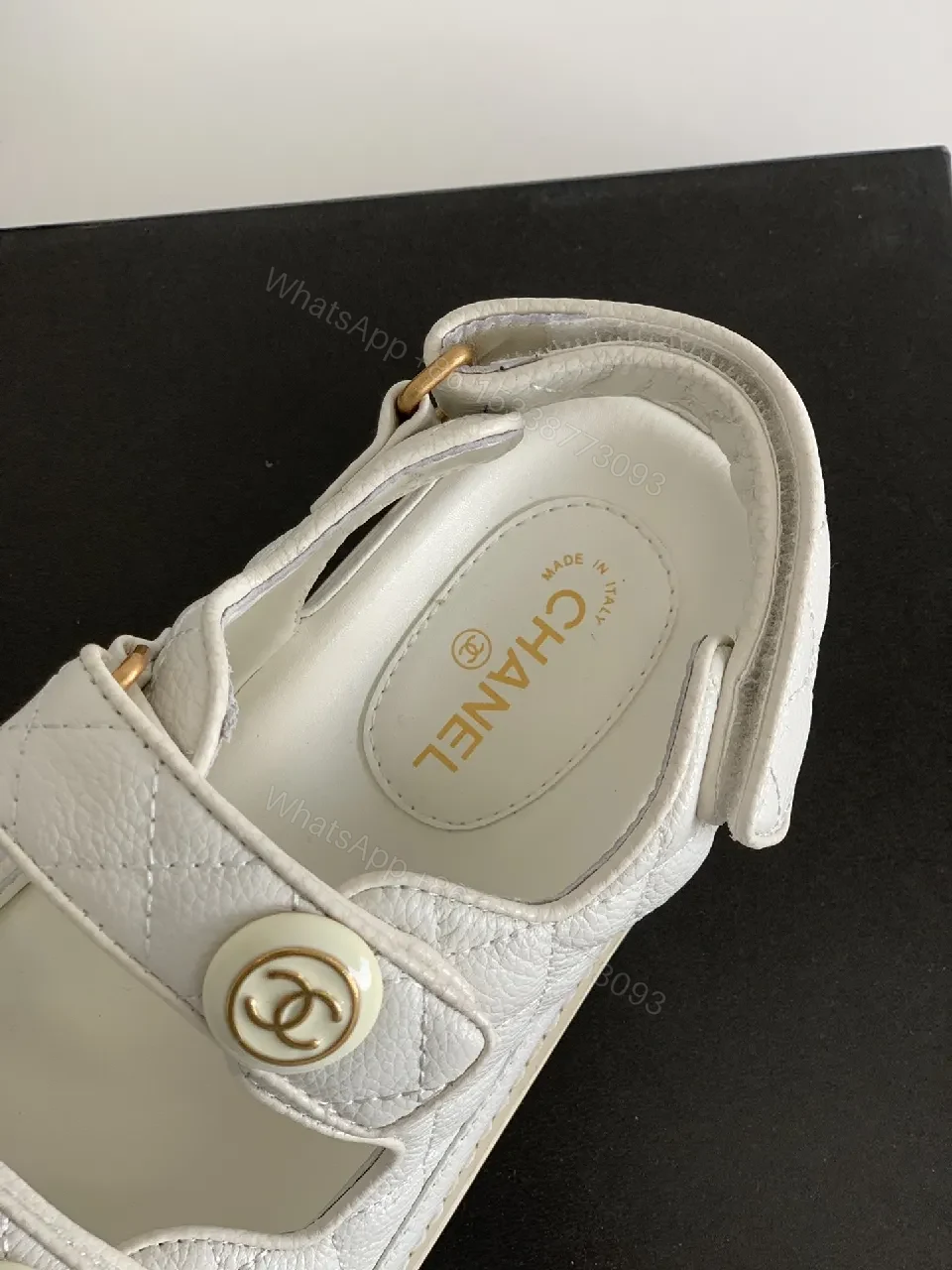 View 4 of White Quilted Sandals with Gold Emblem – Luxe Comfort Sandals