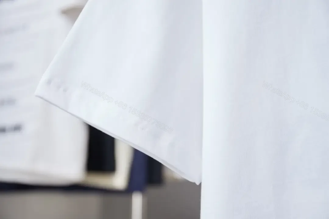 View 3 of Minimalist Luxe Tee with Subtle Crest – White Cotton Tee