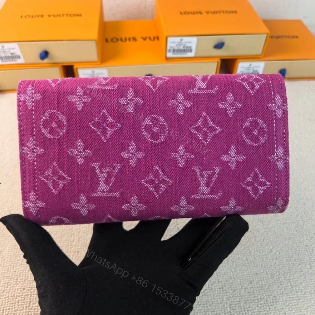 View 3 of Louis Vuitton Sarah Wallet Fuchsia Denim 19cm M28280