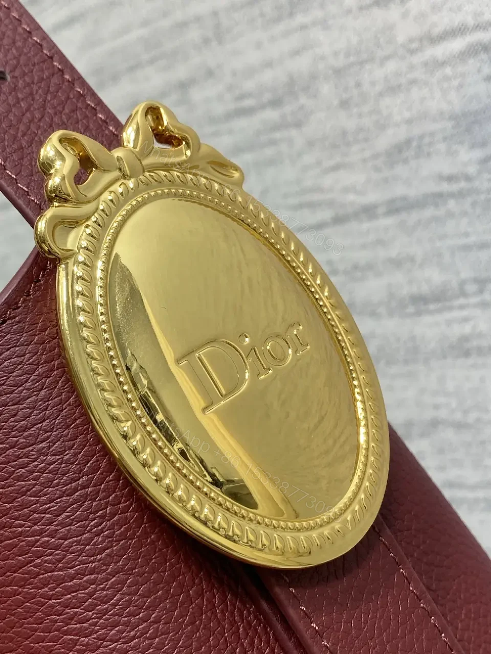 View 4 of Burgundy Pebbled Leather Handbag, Gold Hardware, Dior Monogram Detachable Cardholder Strap