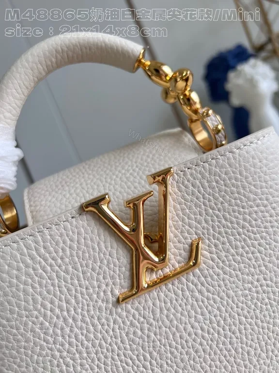 View 9 of Pristine White Pebbled Mini Bag with LV Hardware