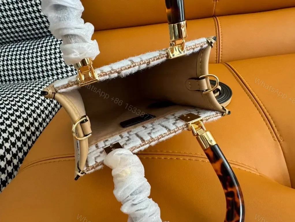 View 3 of Fendi Forma Mini Bag: Monogram Texture, Gold Accents, Crossbody Carry