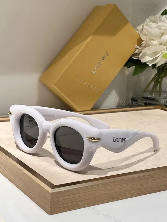 View 6 of Statement Pink Designer Sunglasses: Loewe, UV400, Stylish Comfort