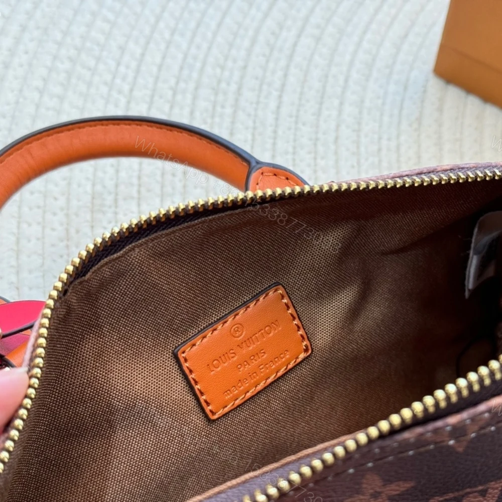 View 9 of Louis Vuitton Keepall Bandoulière 25 Monogram Dust Coated Canvas Brown 25Cm M11542