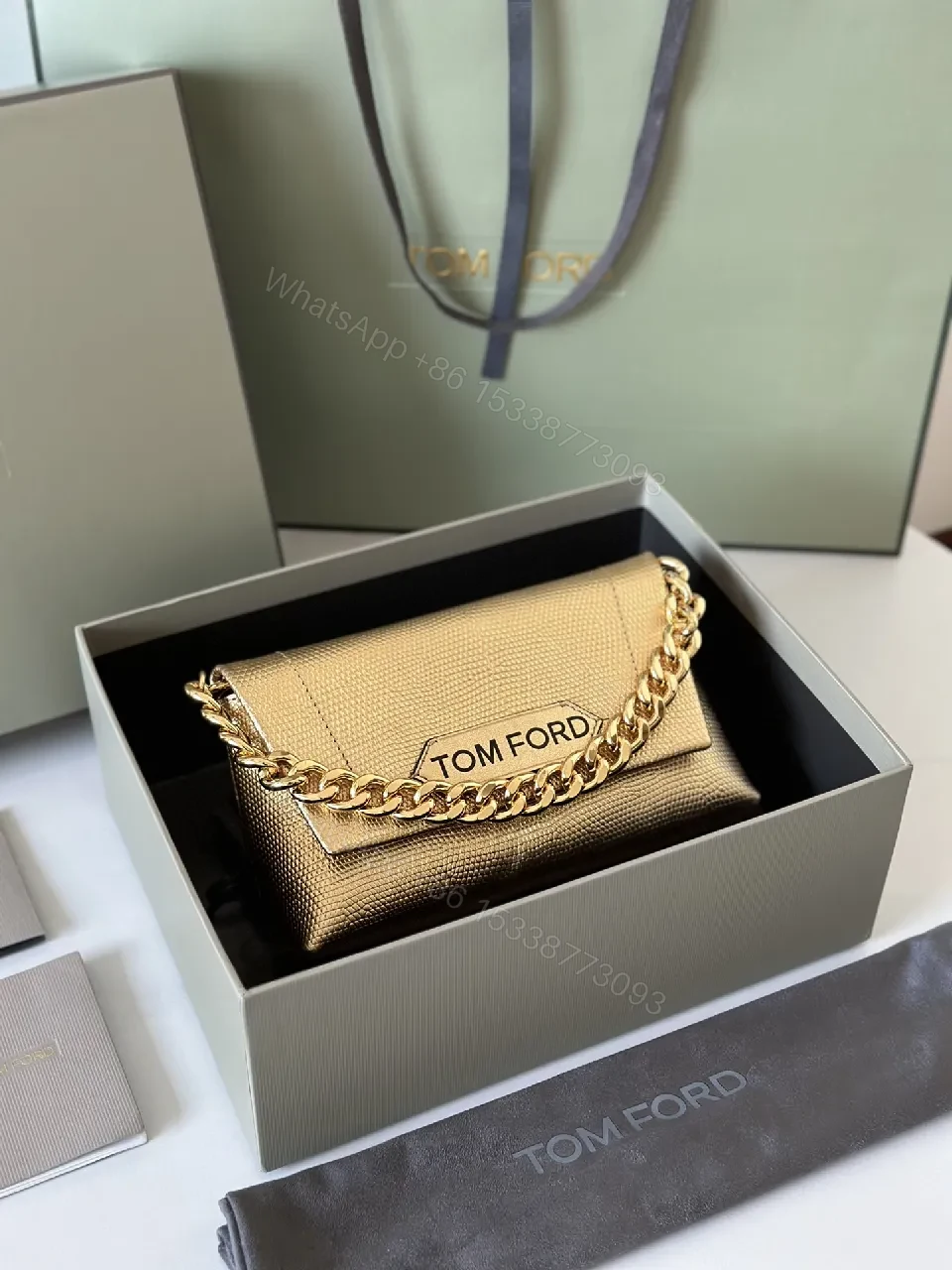 View 8 of Textured Leather Mini Bag with Bold Gold Chain Accent