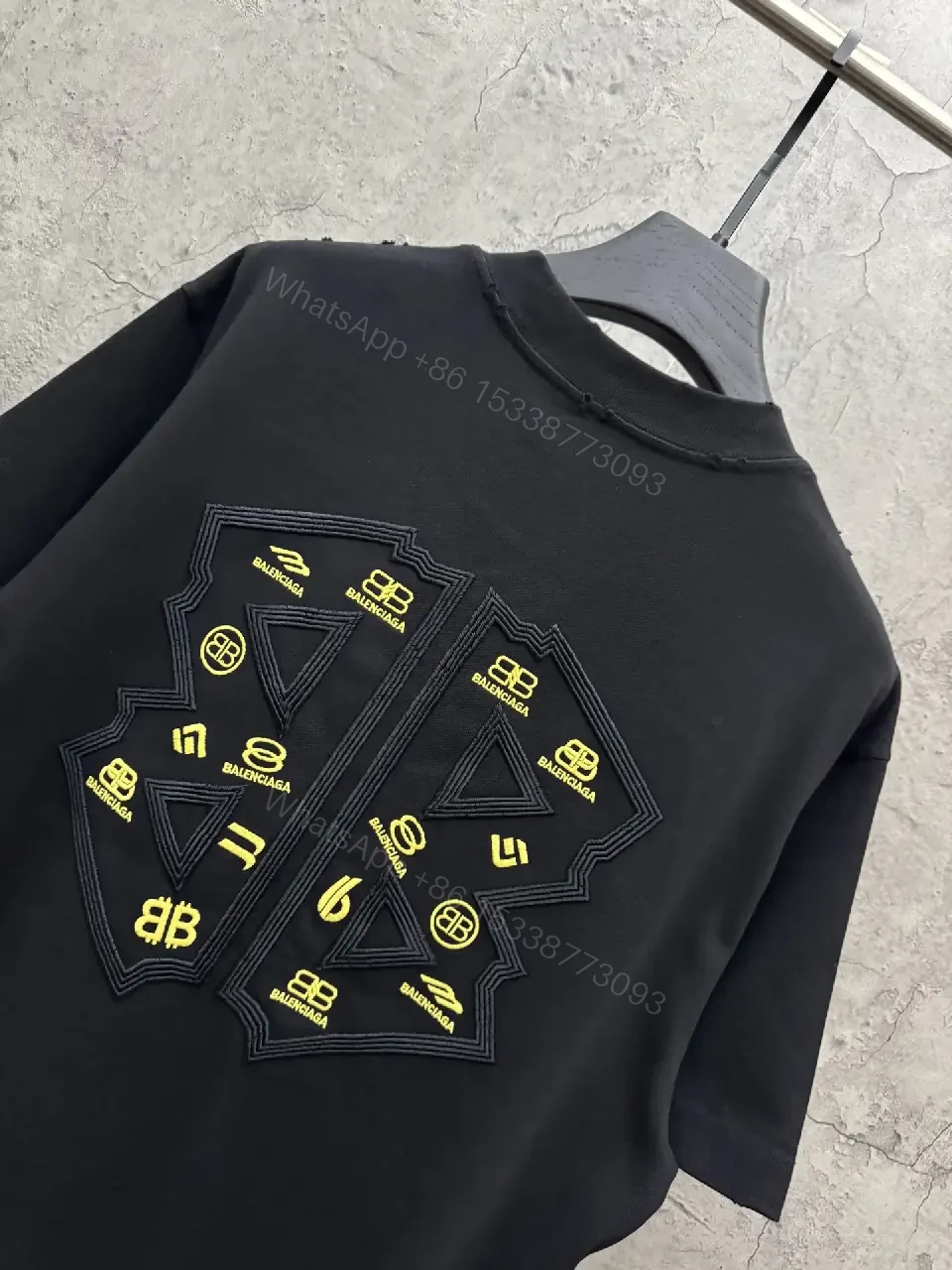 View 6 of Textured Logo Black Knit Tee – Oversized Luxury Streetwear