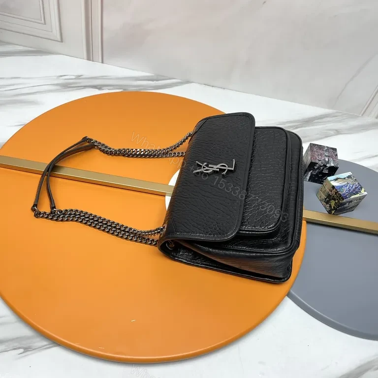 View 7 of Pebbled Leather Shoulder Bag â€“ Compact Luxury with Signature Hardware