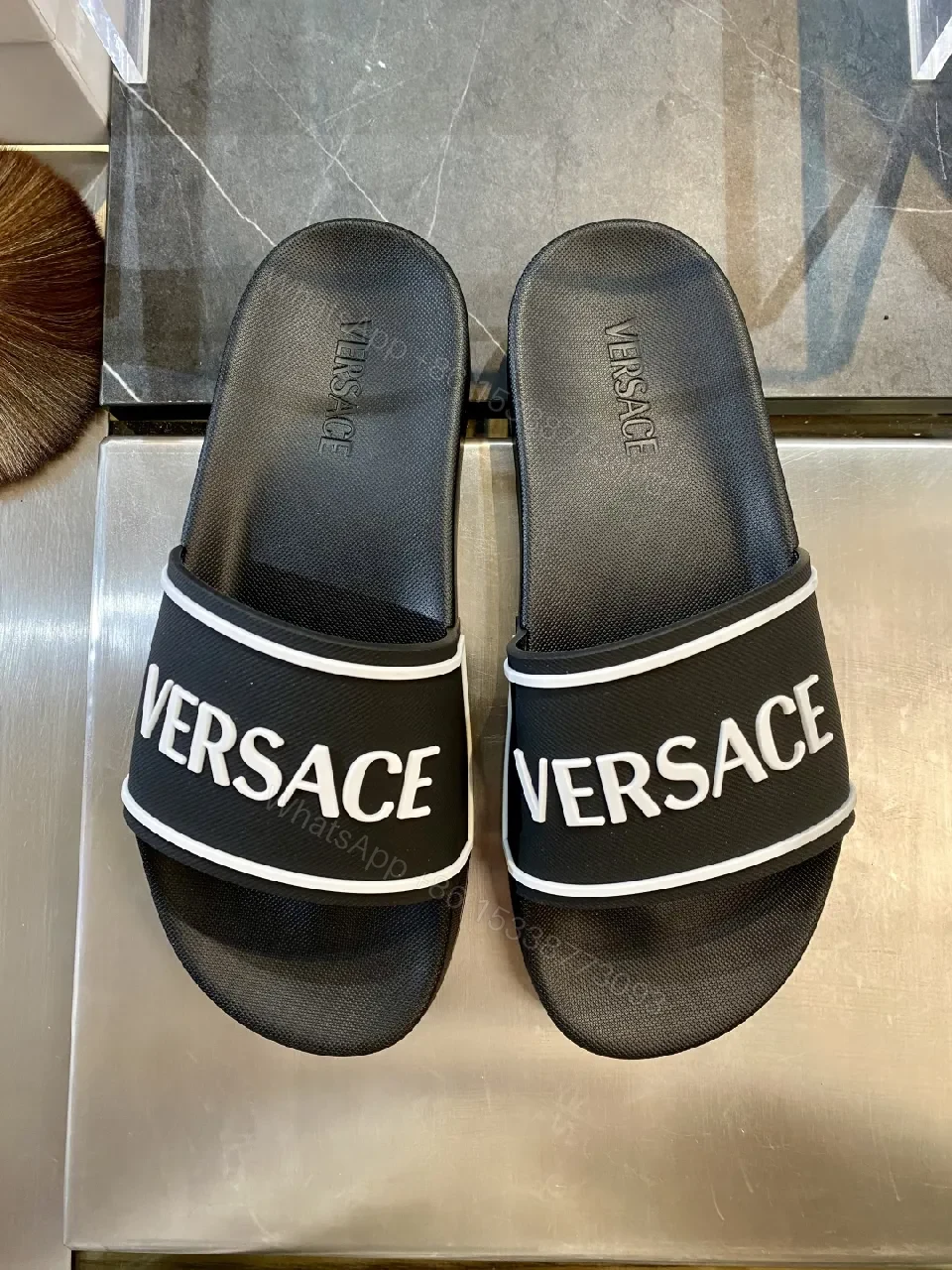 Bold Black + EVA Slide Sandals + Open-Toe Luxe + Signature Branding Comfort + Sandals — view 1
