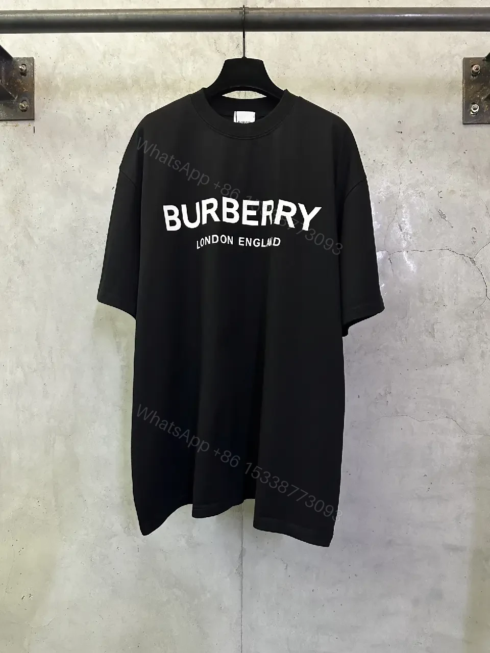 View 5 of Oversized Black Logo Cotton Tee – Modern Streetwear Essential