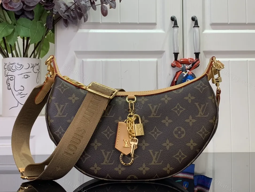 Rose Gold Hardware Crescent Bag: Monogram-Canvas Crossbody — view 1