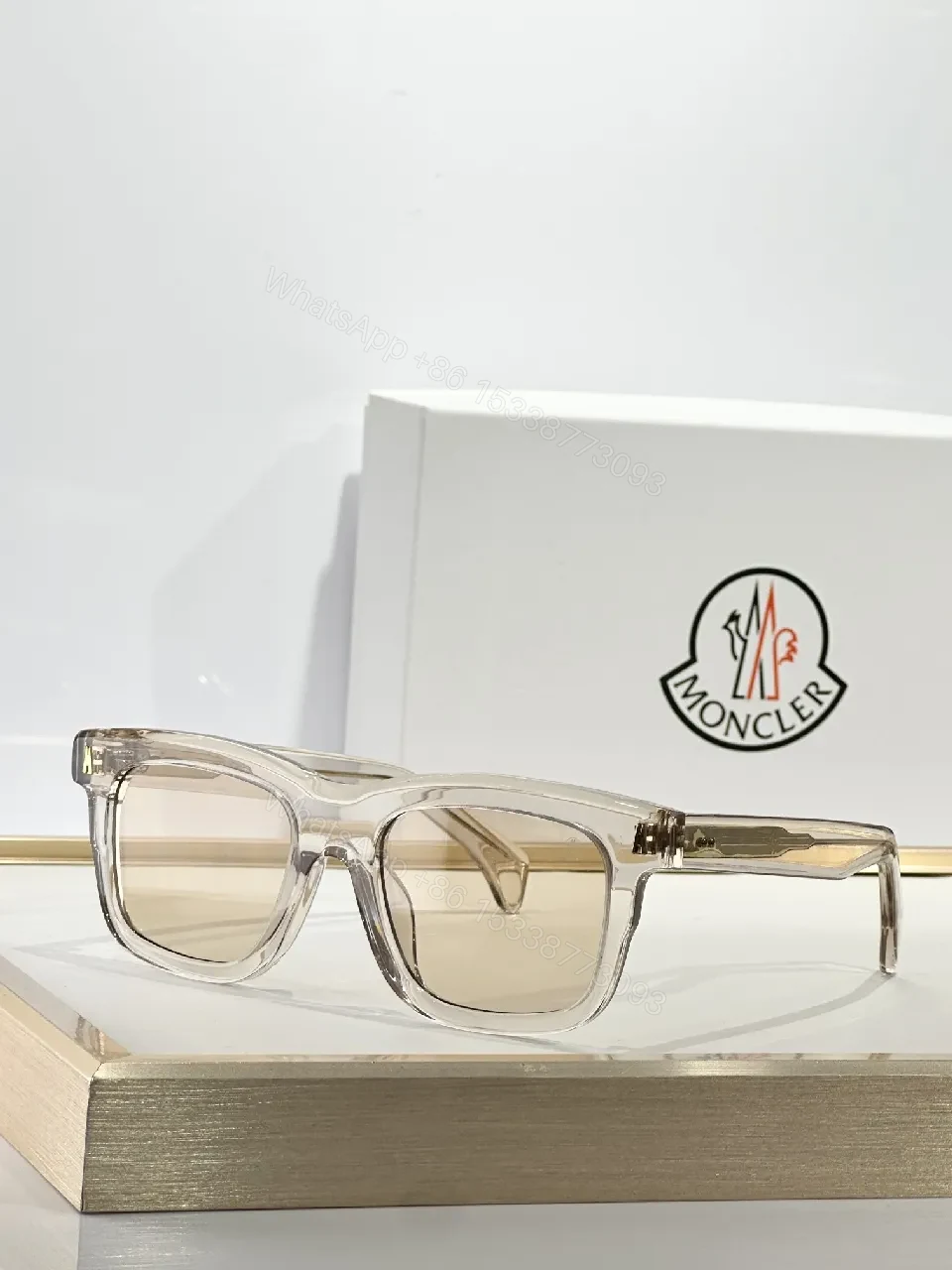View 7 of Translucent Frame Sunglasses with Amber Lenses and Gold Accents