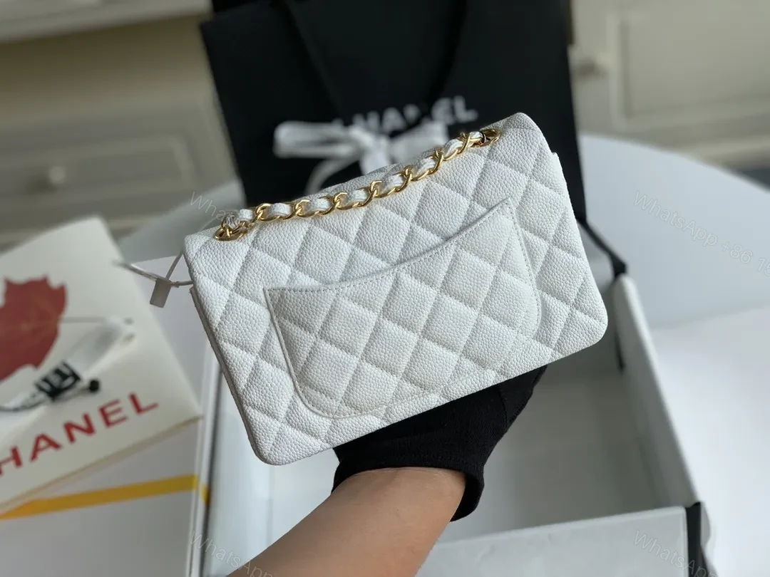 View 2 of Ivory Quilted Leather Mini Flap Bag - Elegant Everyday Luxury