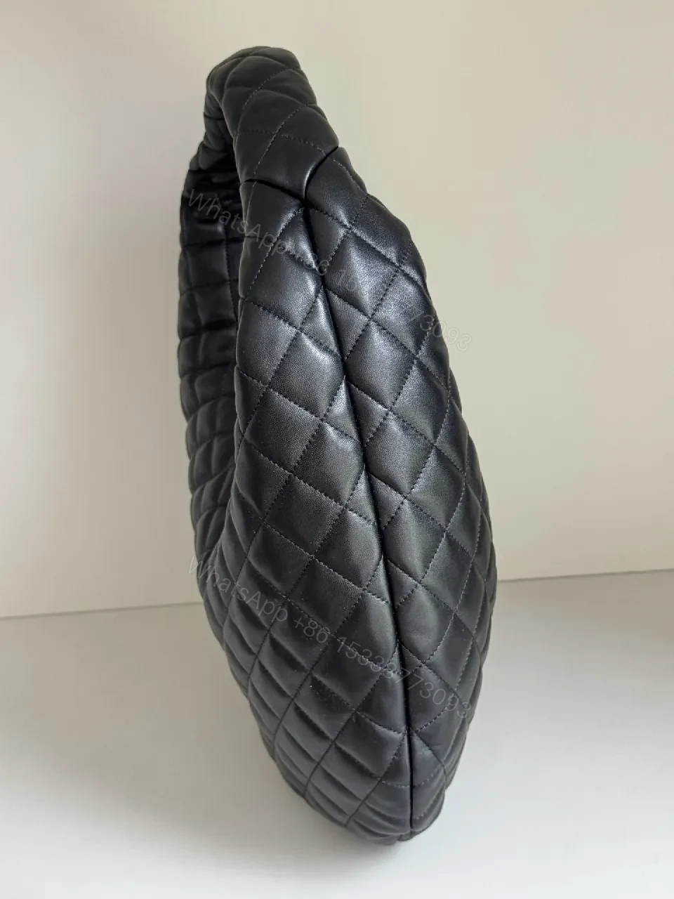 View 7 of Quilted Black Faux Leather Hobo Bag: Luxury, Comfort, Modern Style