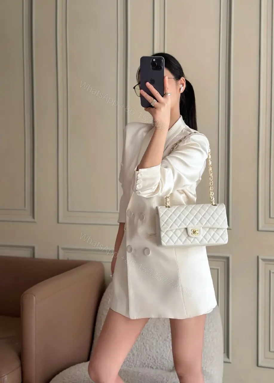 View 8 of Grey quilted leather chain-strap shoulder bag, luxury monogram-inspired pattern for everyday elegance