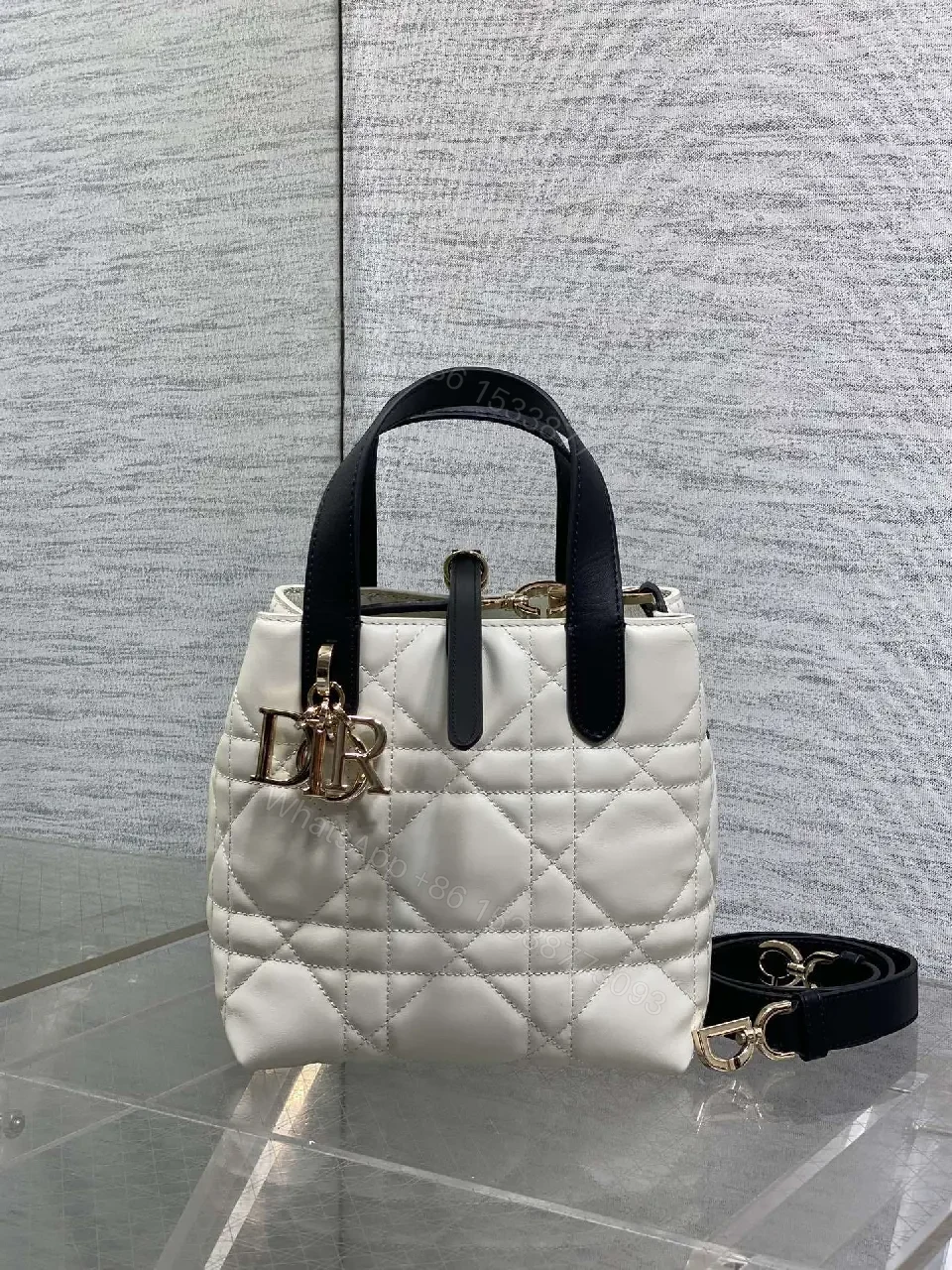 Quilted Mini Handbag with Gold Charm - Compact Luxury Bag — view 1