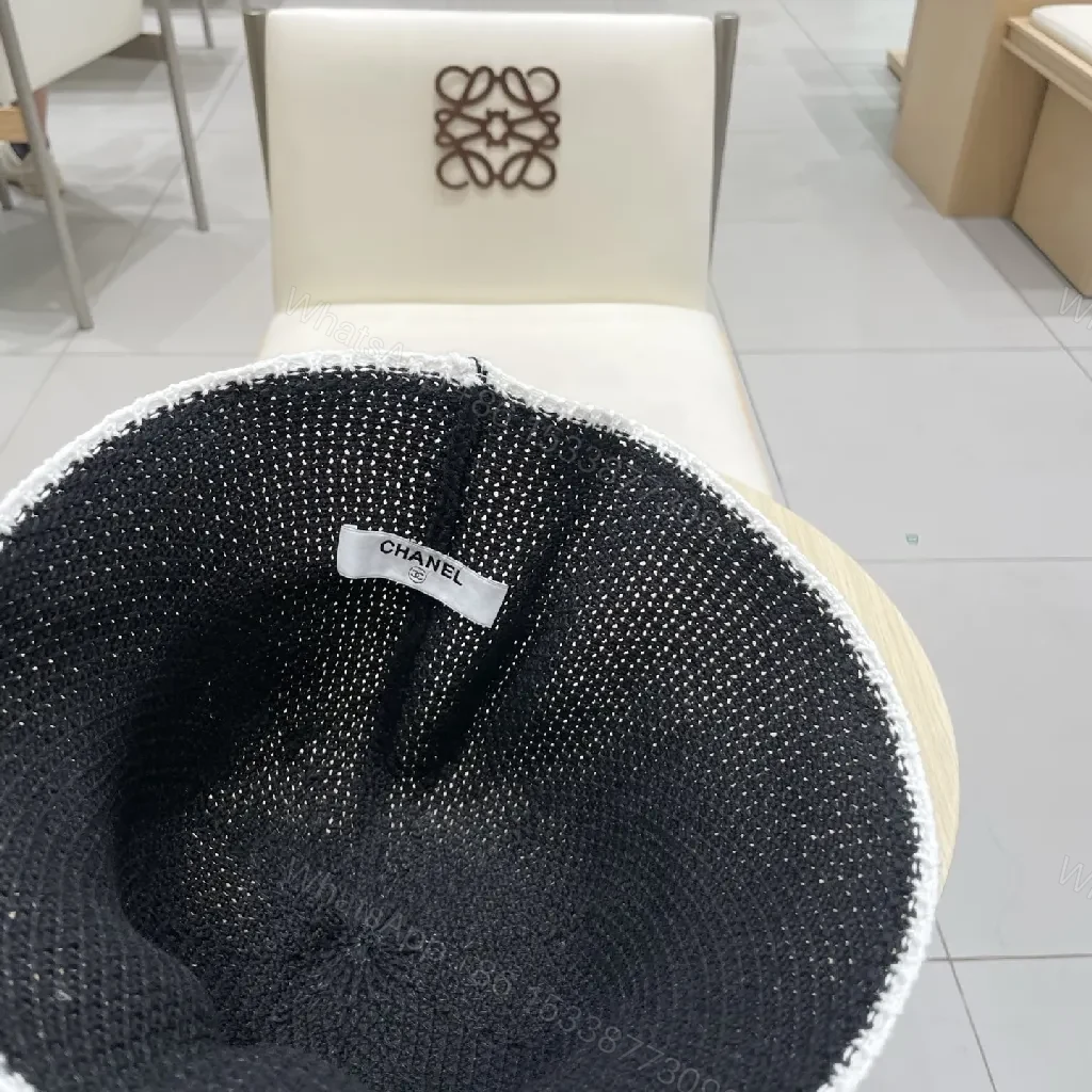 View 7 of Black Knit Bucket Hat – Luxe Parisian-Style with Subtle Emblem