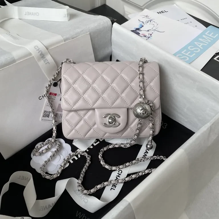 Soft Quilted Pink Mini Bag with Iconic Chain Strap — view 1