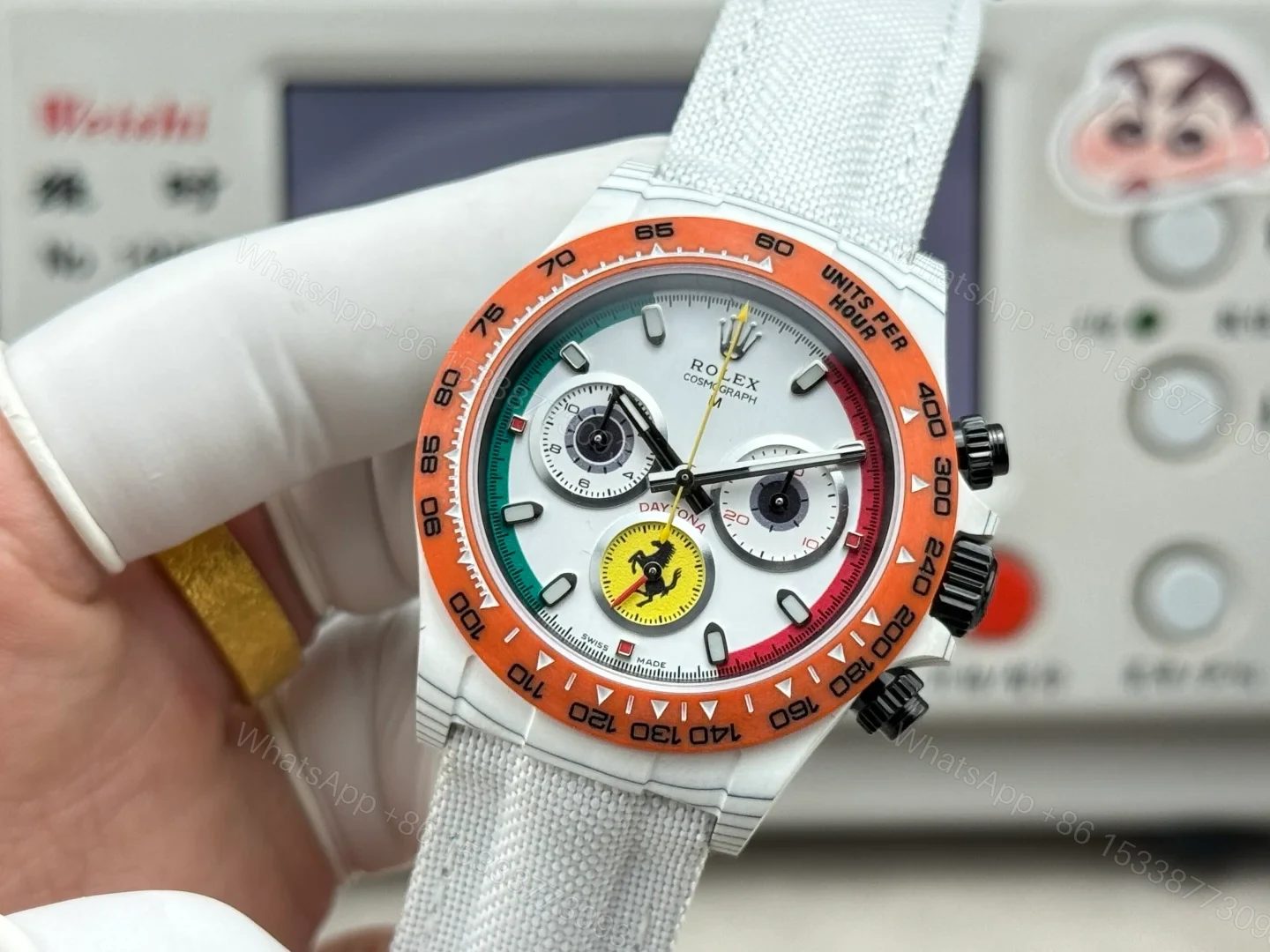 View 3 of Rolex Daytona Carbon Fiber White Replica 40MM Exclusive Orange Bezel White Fabric Strap R74 RG-ROLEX-DAYTONA-WHITE-DIAL