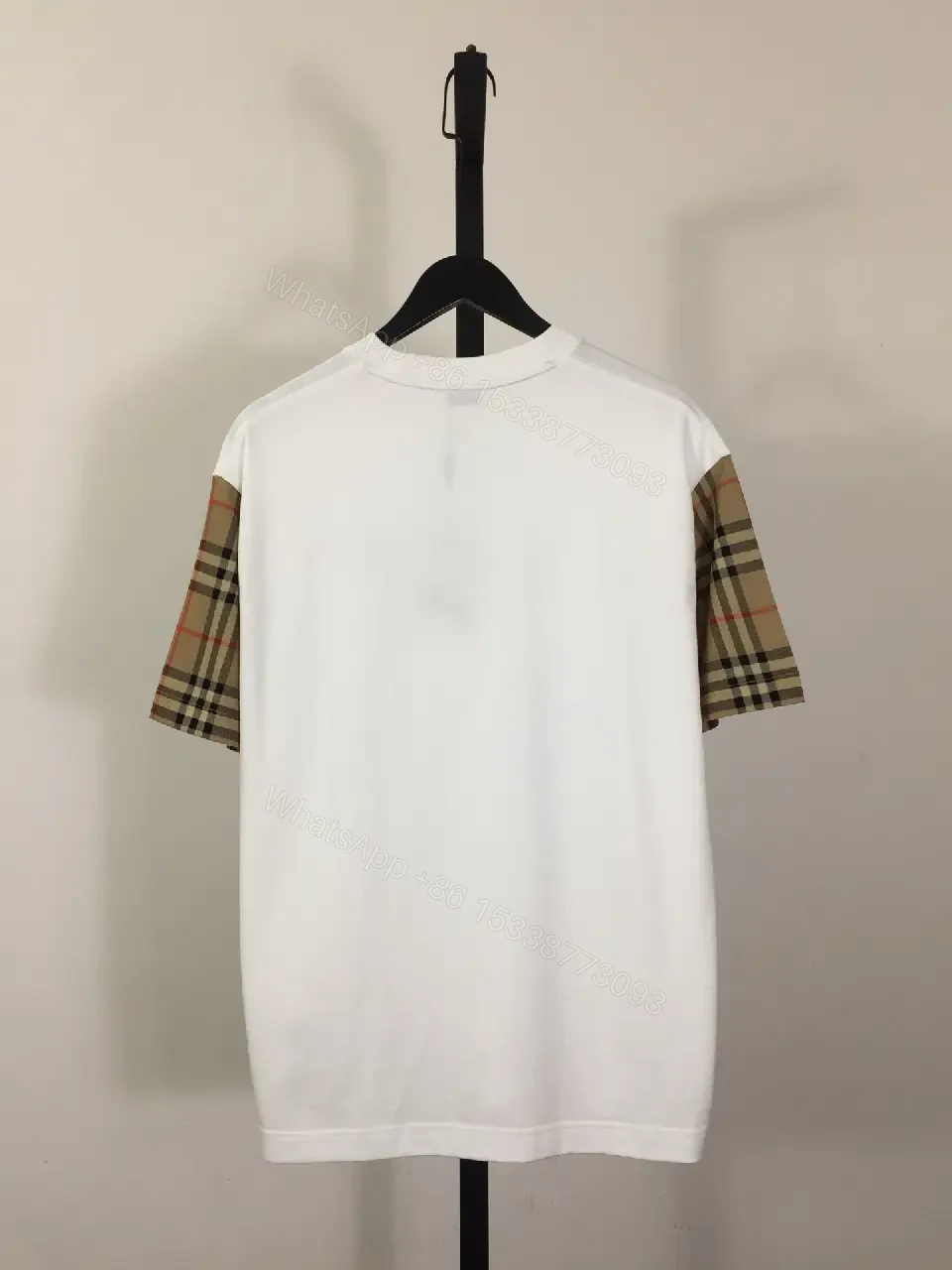 View 2 of White Tee with Burberry-Check Sleeves: Minimalist Luxury Top