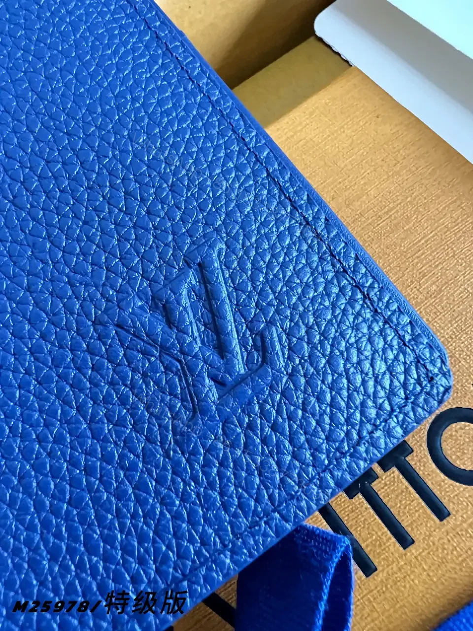 View 8 of Blue Pebbled Leather Wallet, Rectangular, Folded, LV-Embossed Style